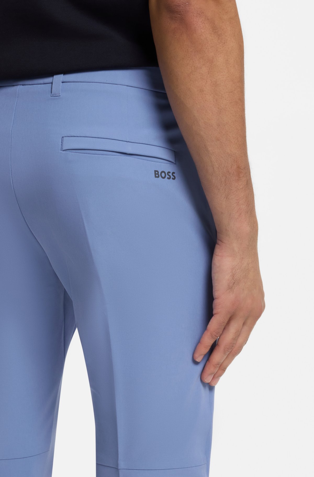 Pantalones ajustados en tejido elástico resistente al agua