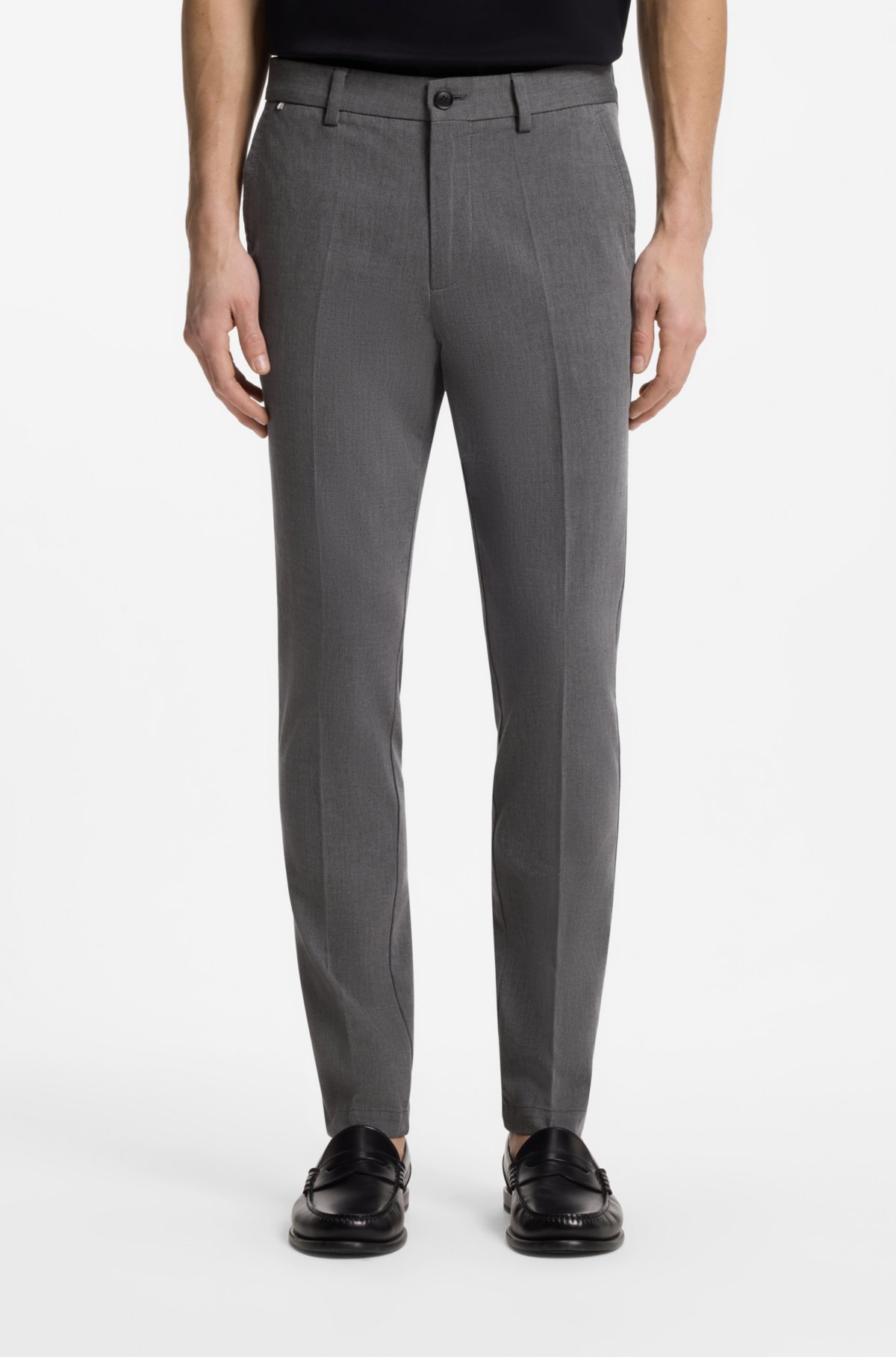 Pantalones ajustados de algodón elástico dobby