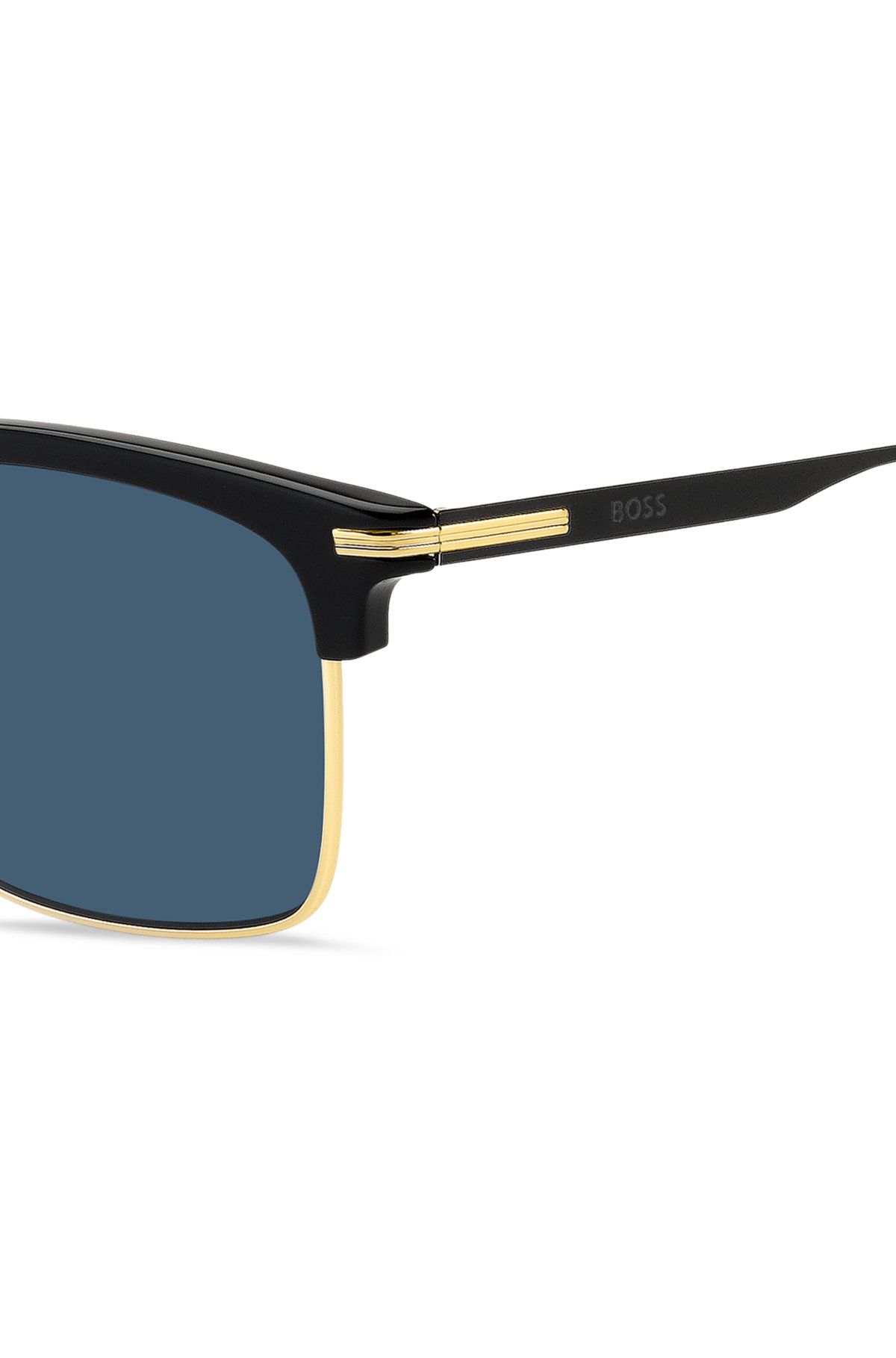 Gafas de sol con lentes azules y montura negra y dorada