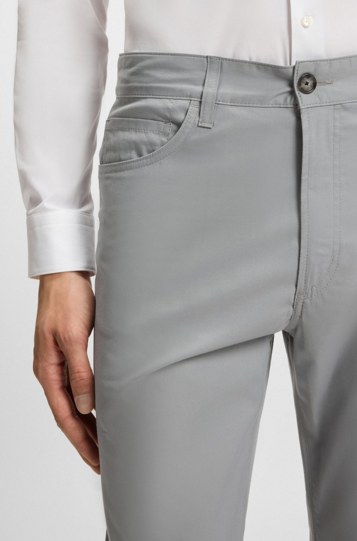 Pantalones ajustados de algodón, seda y elastano