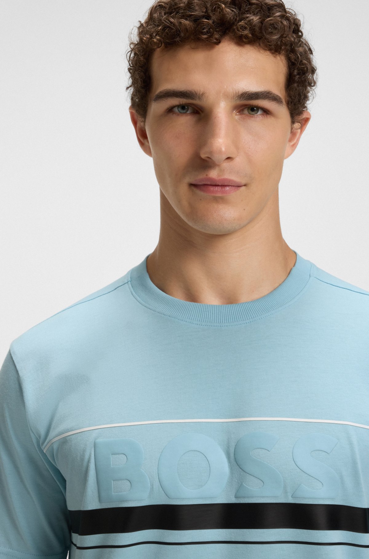 Camiseta de algodón con estampado de logo y rayas
