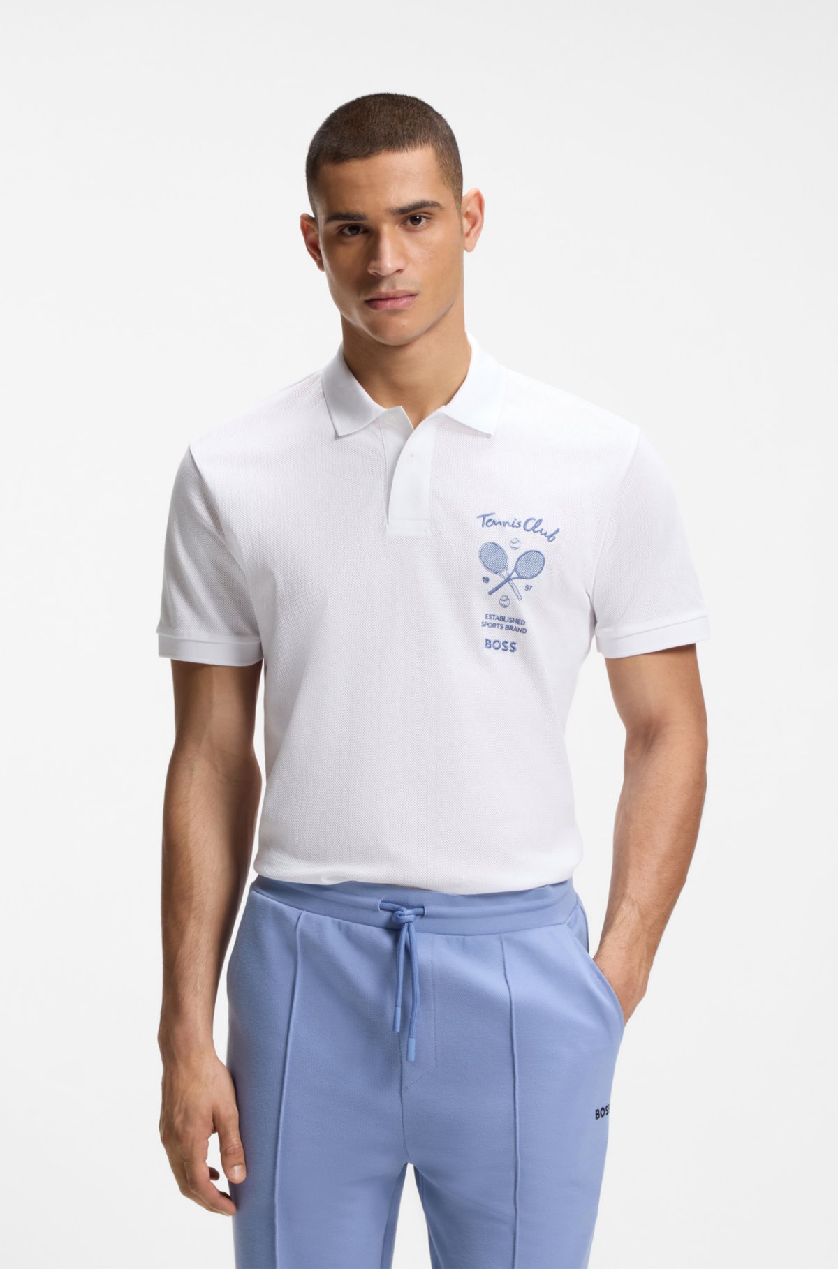 Camiseta polo con estampado artístico en malla de algodón
