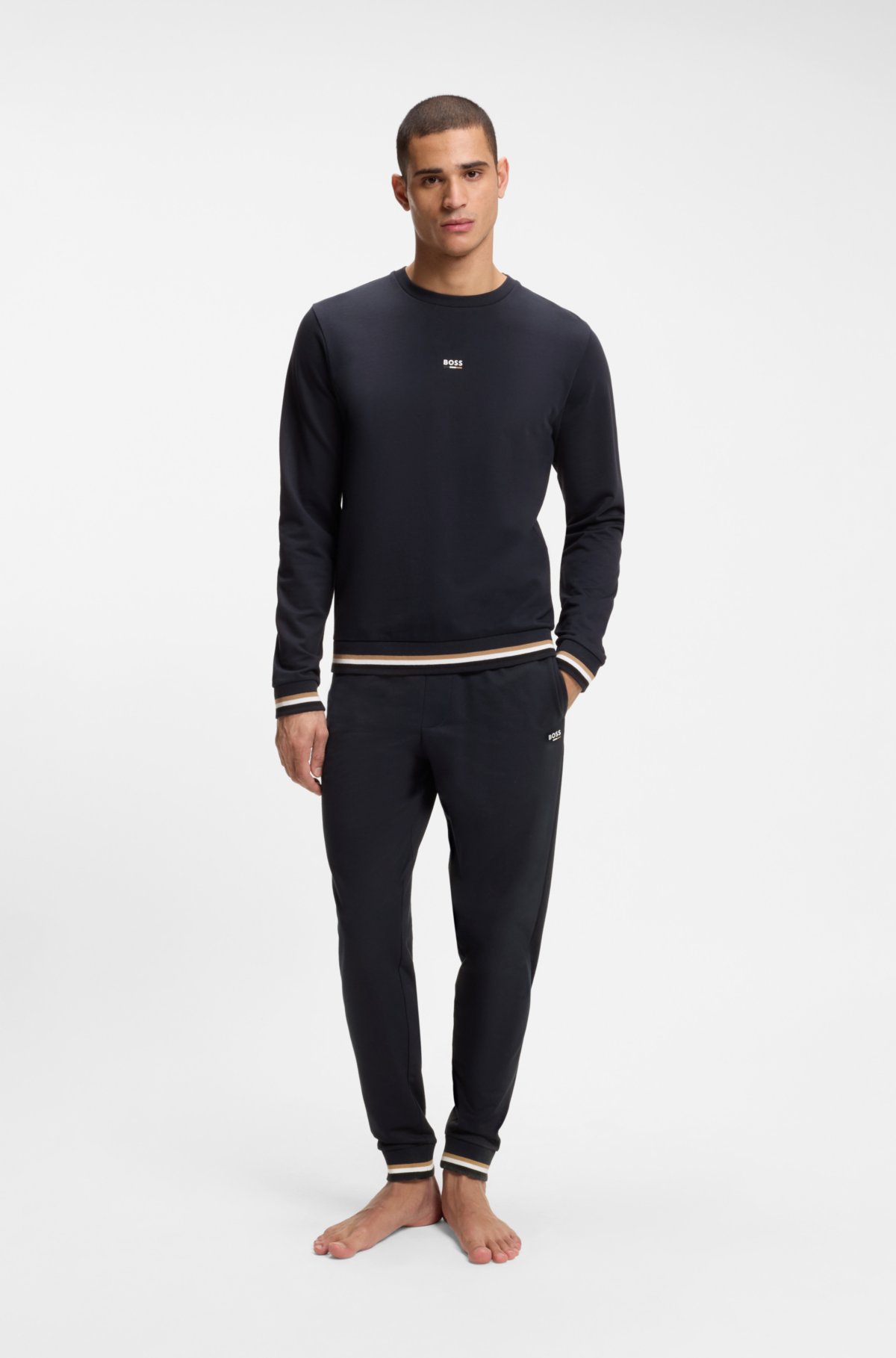 Pantalones de chándal de algodón-terciopelo con rayas características y logotipo