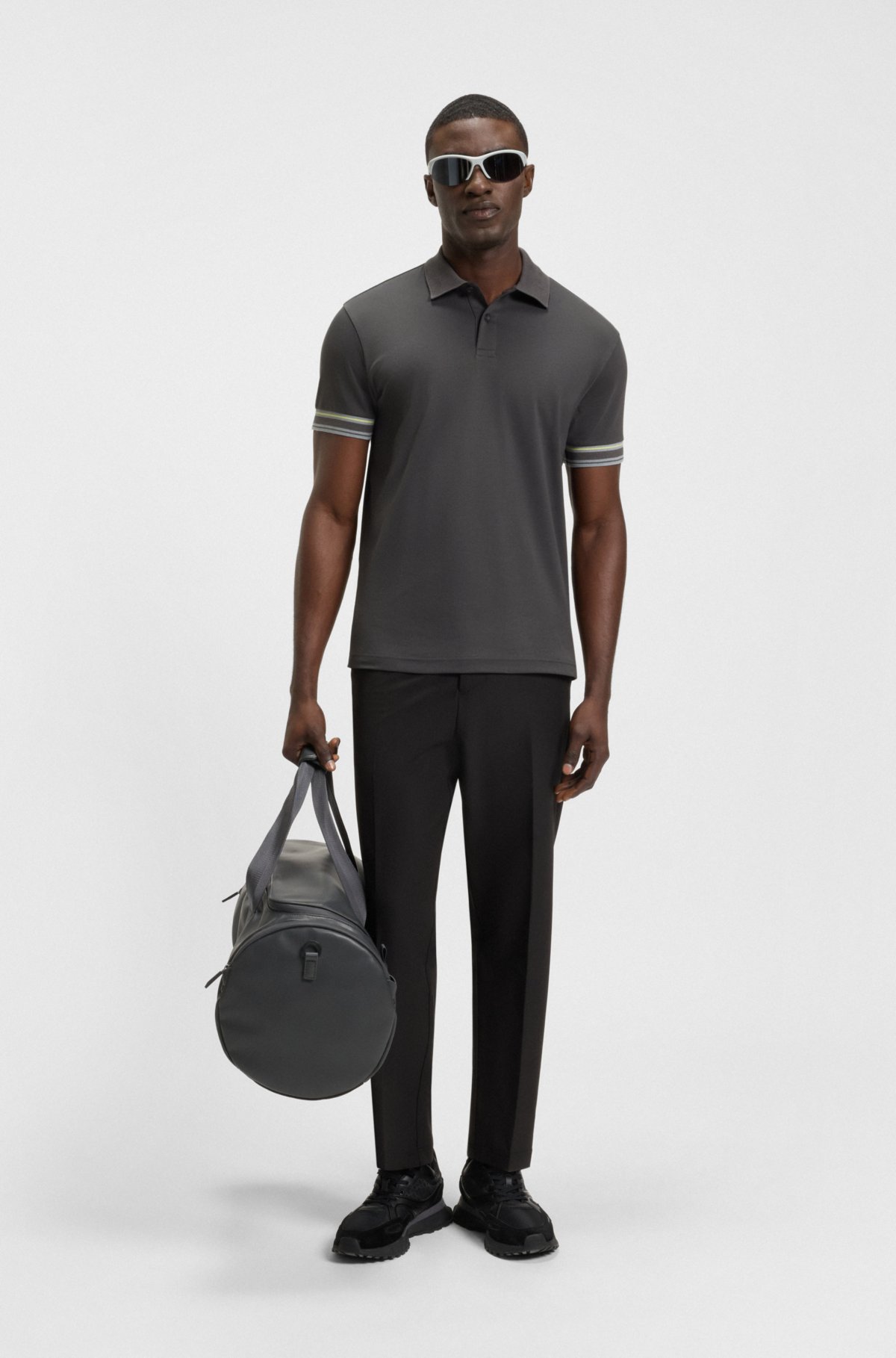 Camiseta polo con puños de cinta en algodón interlock
