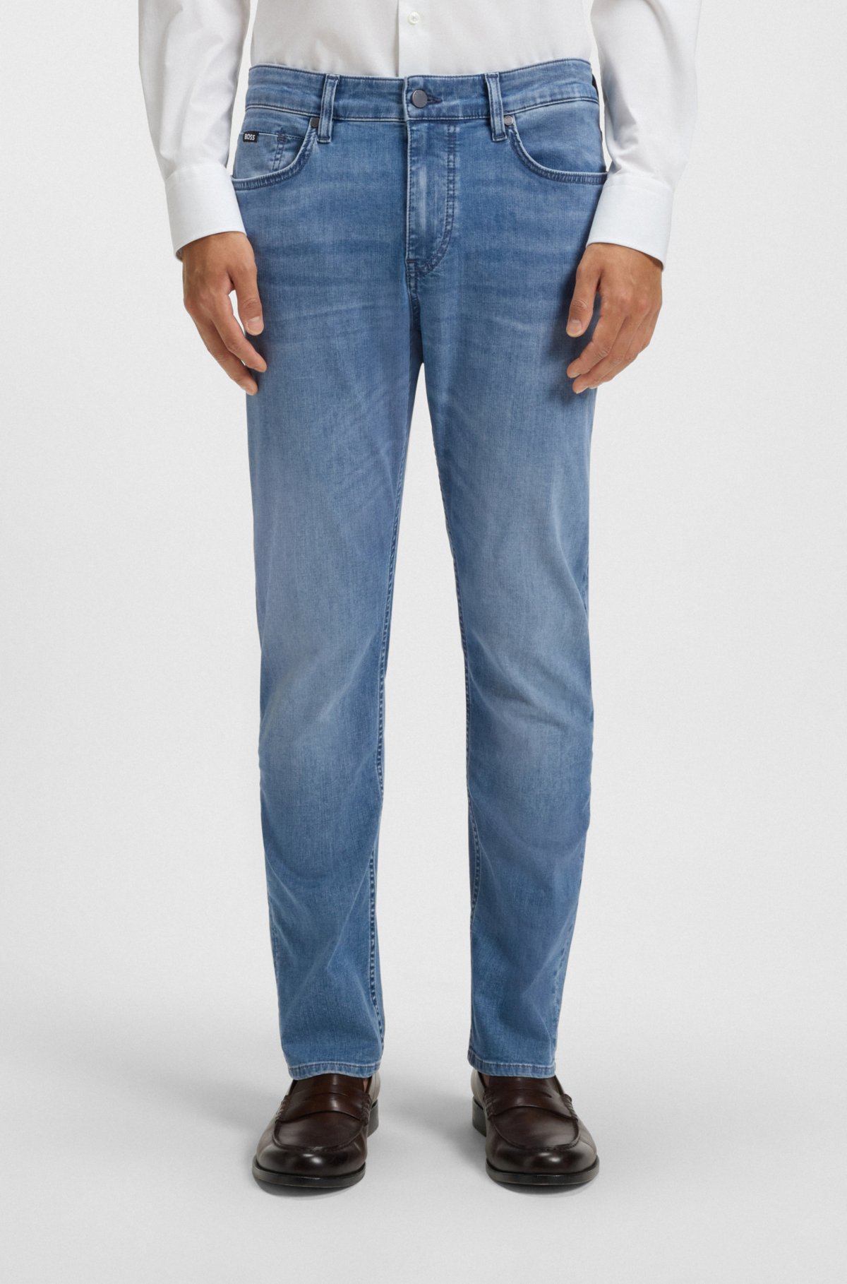 Pantalones vaqueros azules ajustados de denim de rendimiento