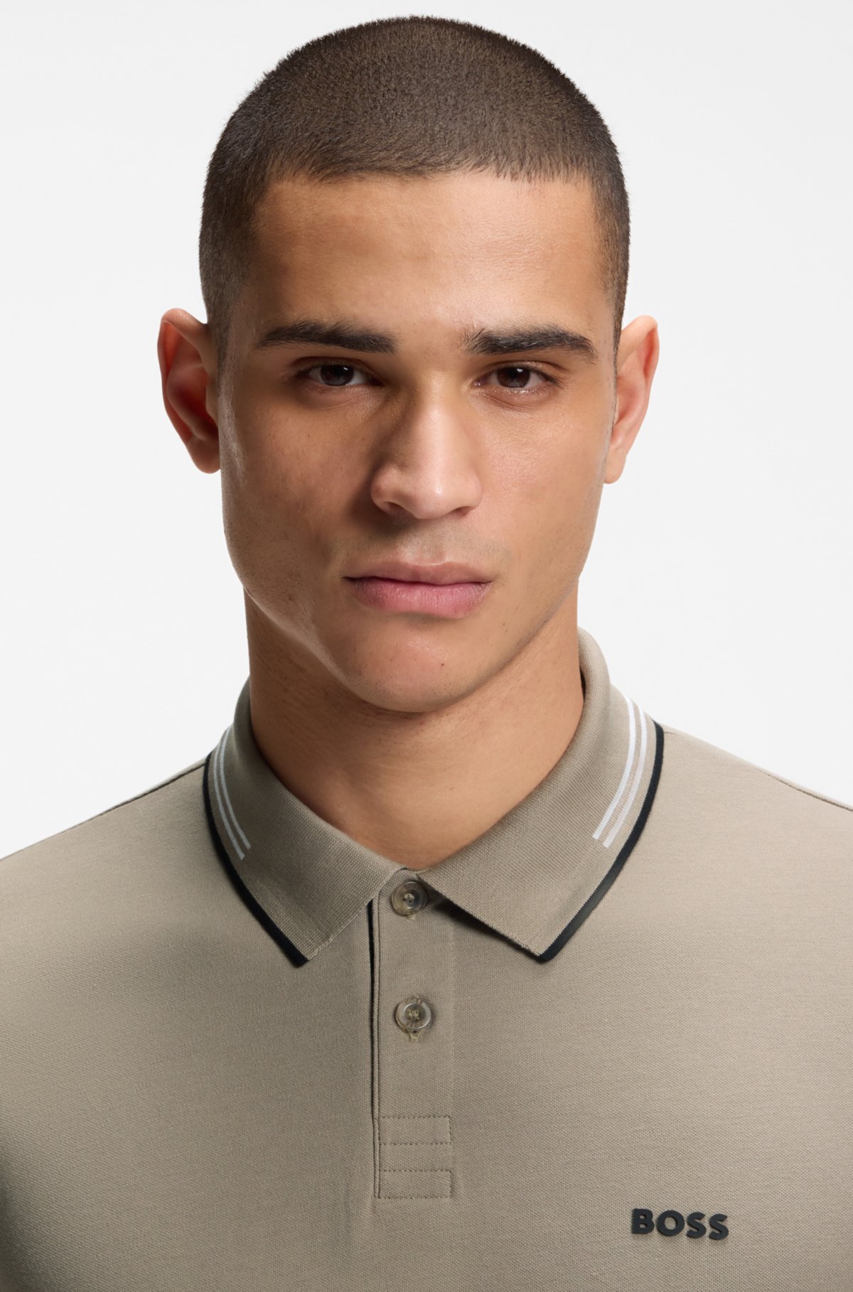 Camiseta polo ajustada de algodón elastizado con marca y rayas