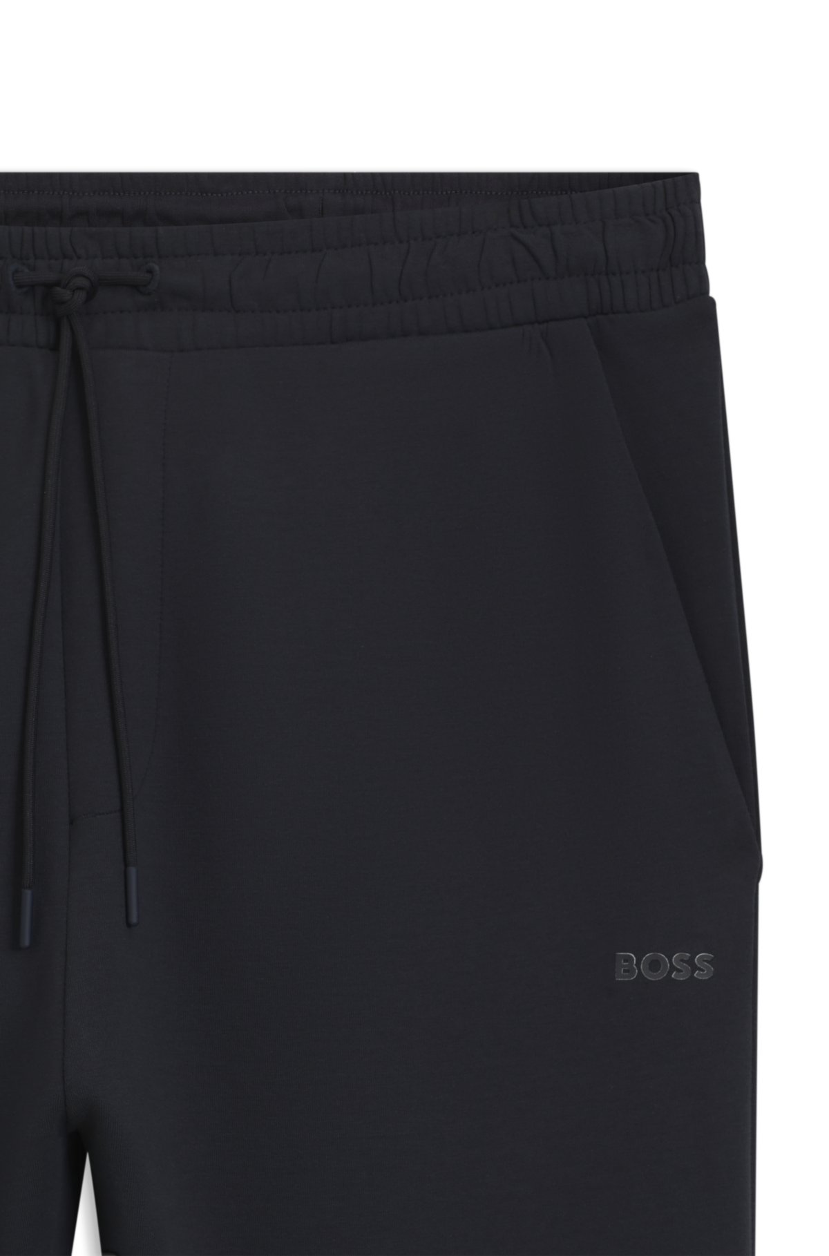 Pantalones de chándal de algodón elástico con estampado de logotipo