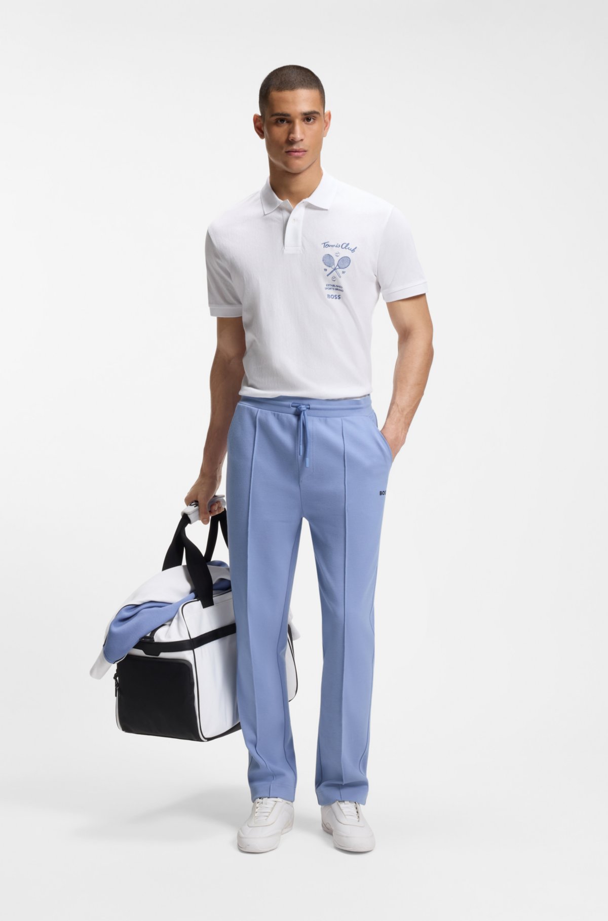 Camiseta polo con estampado artístico en malla de algodón