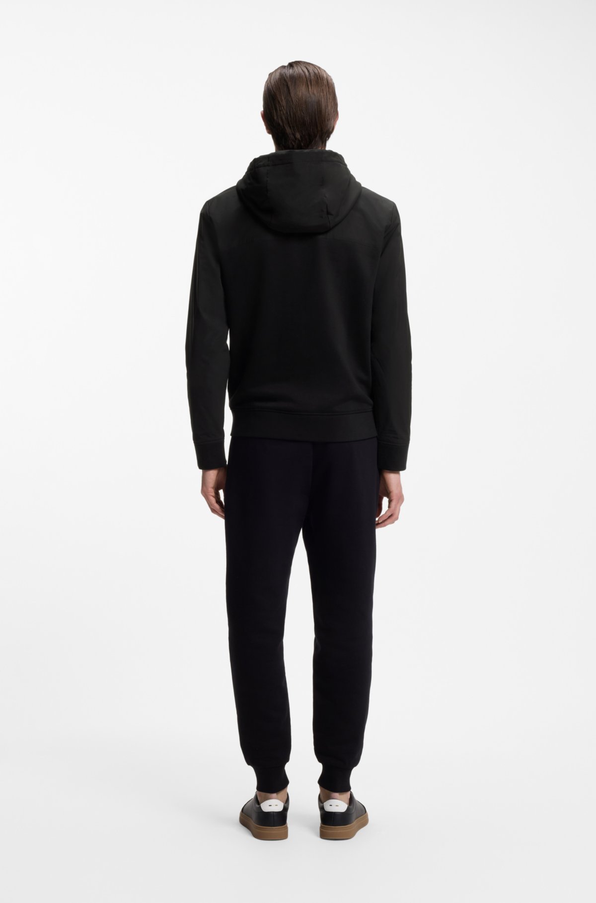 Sudadera de algodón y terciopelo con cremallera y detalles con rayas características