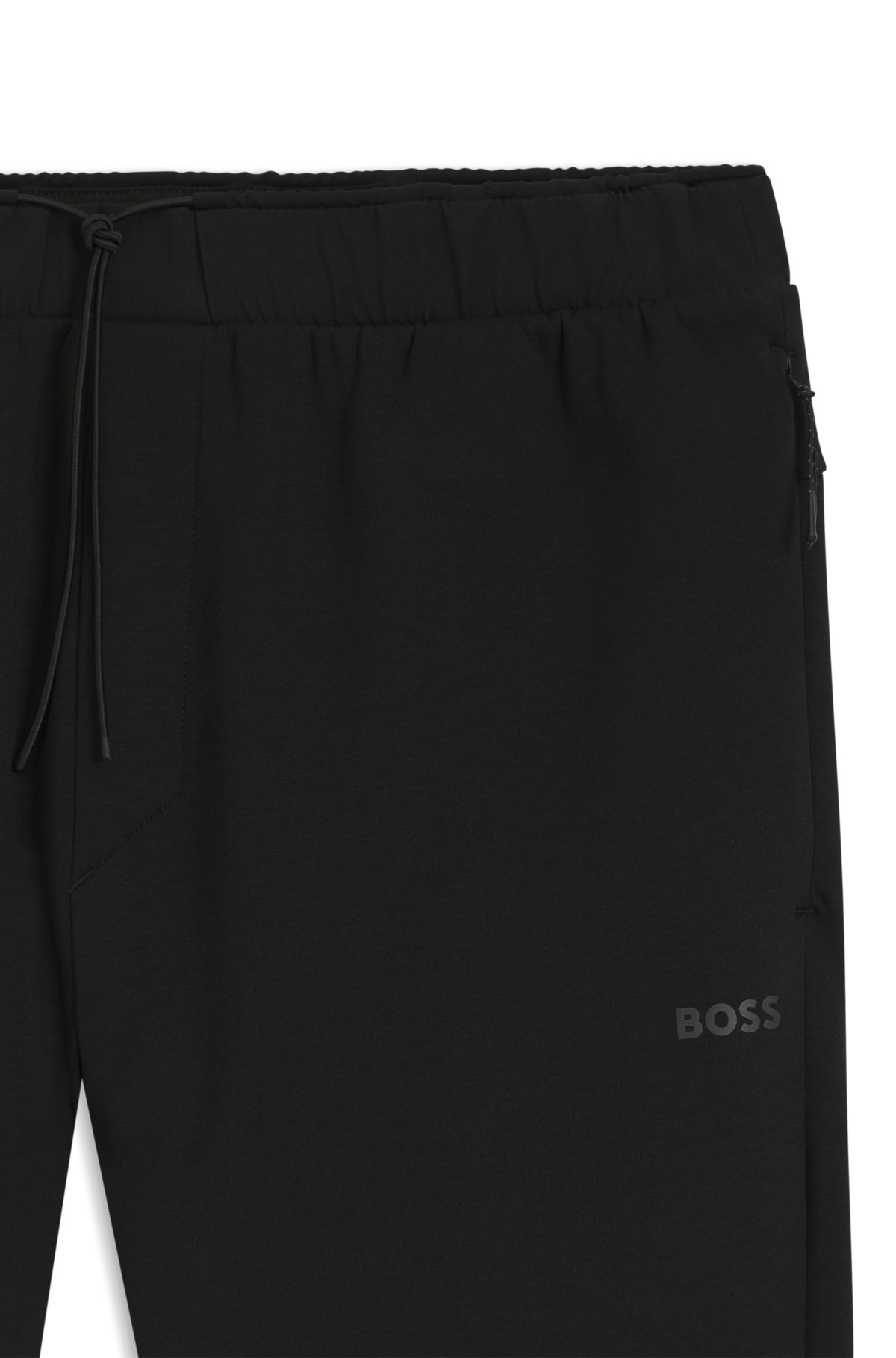 Pantalones de chándal con detalles reflectantes en corte regular