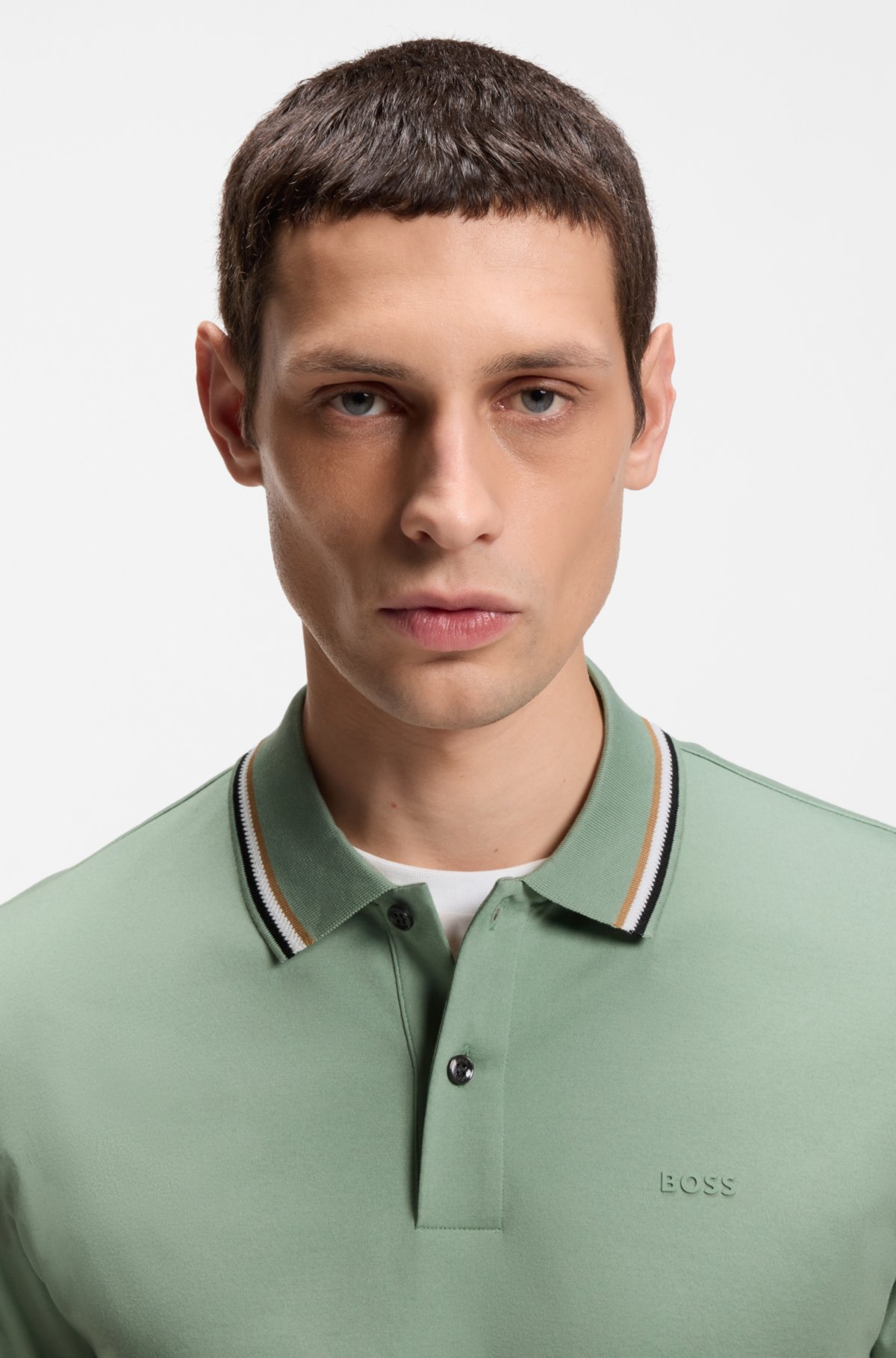 Camiseta de polo ajustada con cuello rayado en algodón con logo