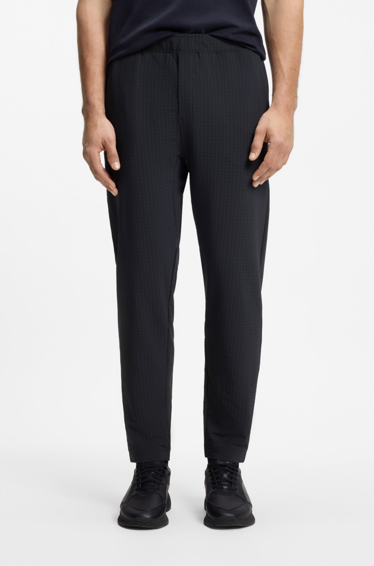 Pantalones de chándal con marco de cremallera en tejido waffle