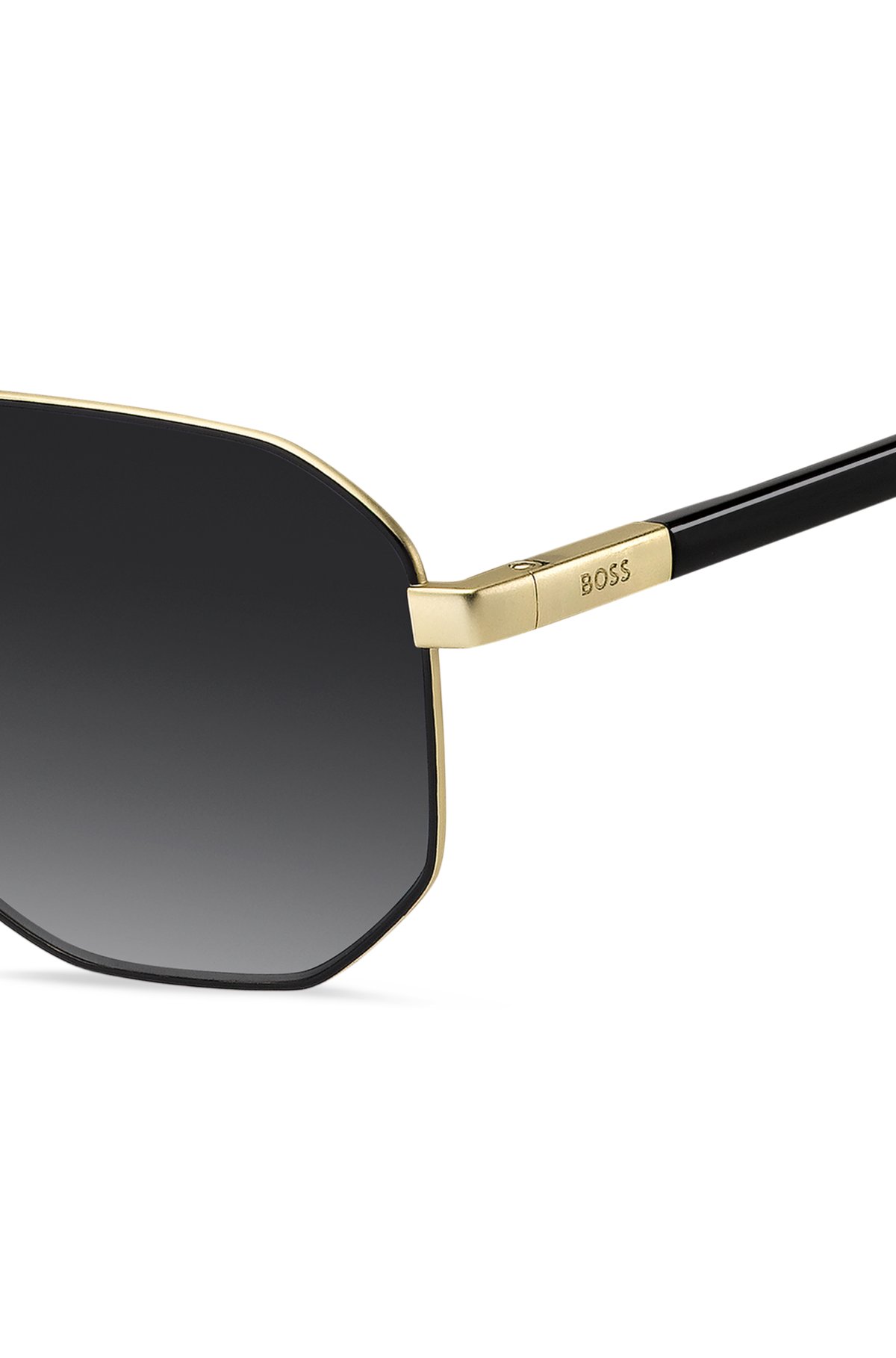 Gafas de sol con tono dorado y detalles negros