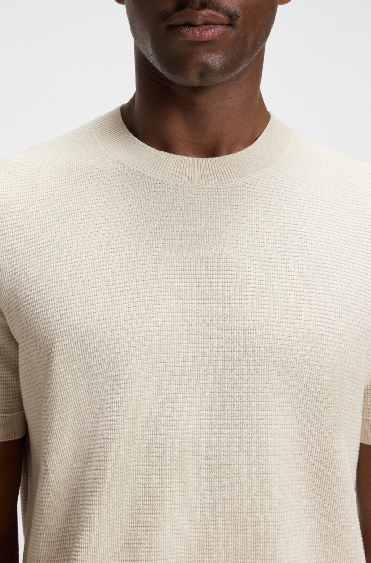Sweater de punto con estructuras mixtas