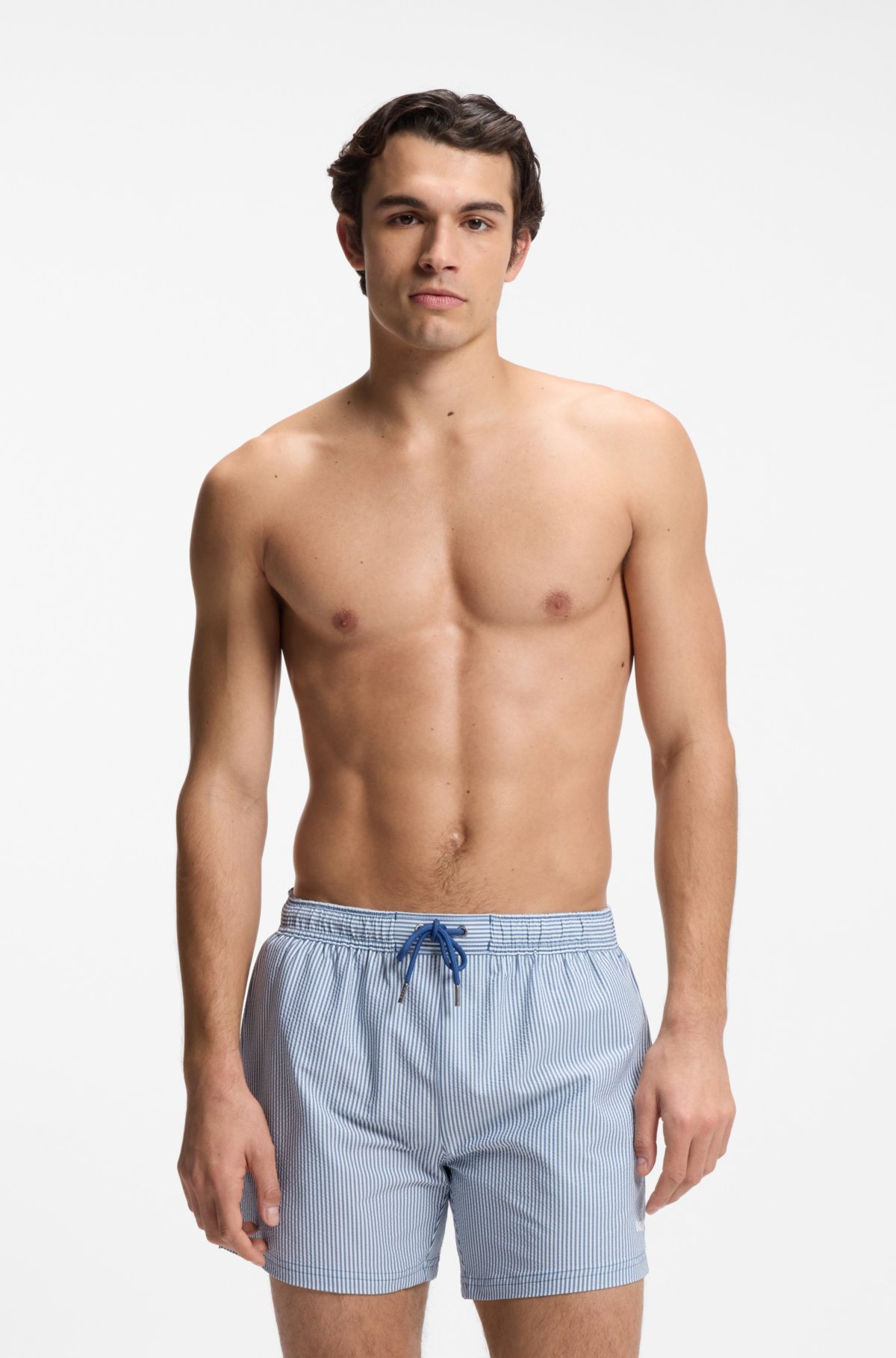 Pantalones cortos de baño con logo bordado en seersucker rayado