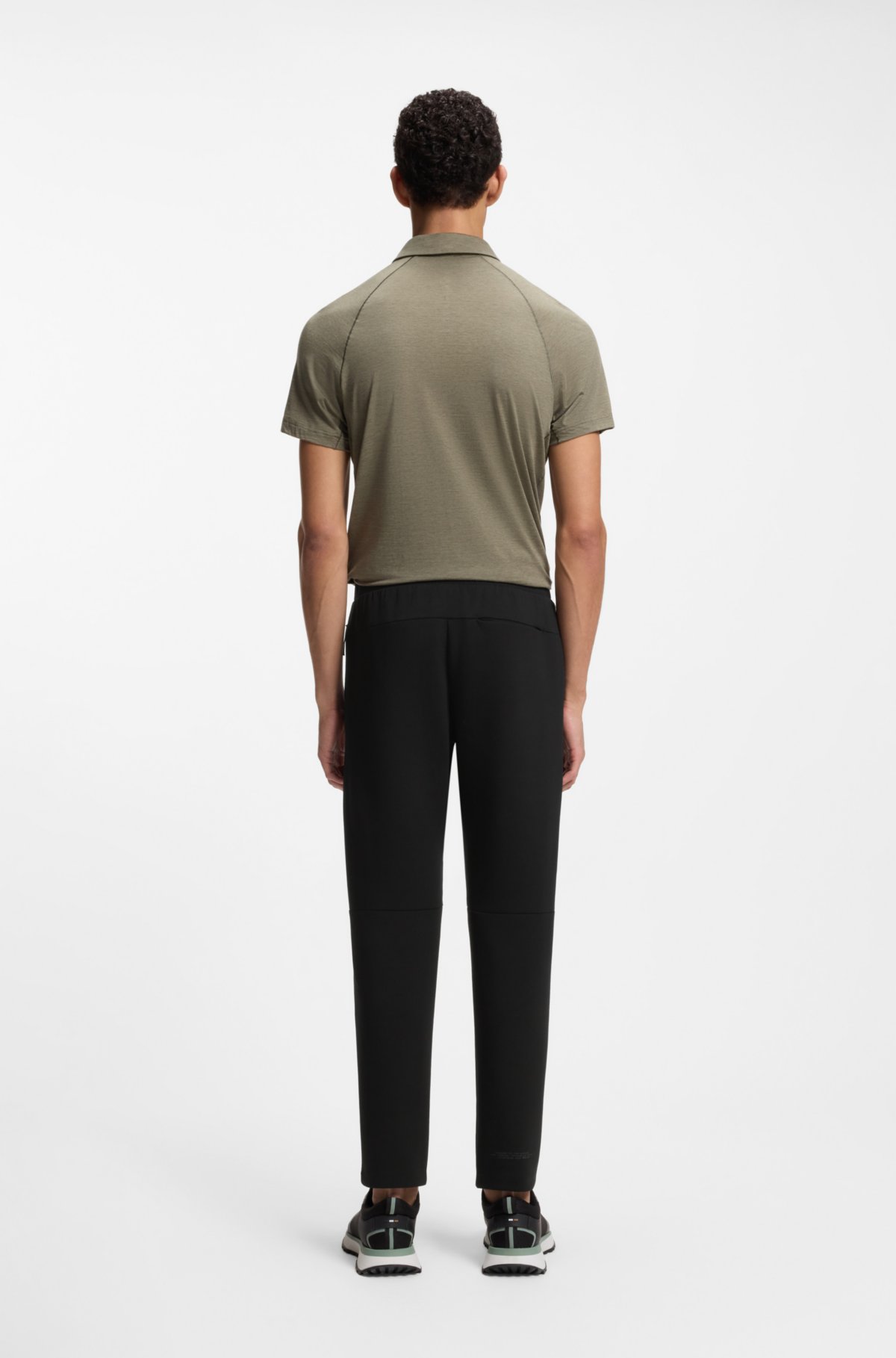 Pantalones de chándal con detalles reflectantes en corte regular