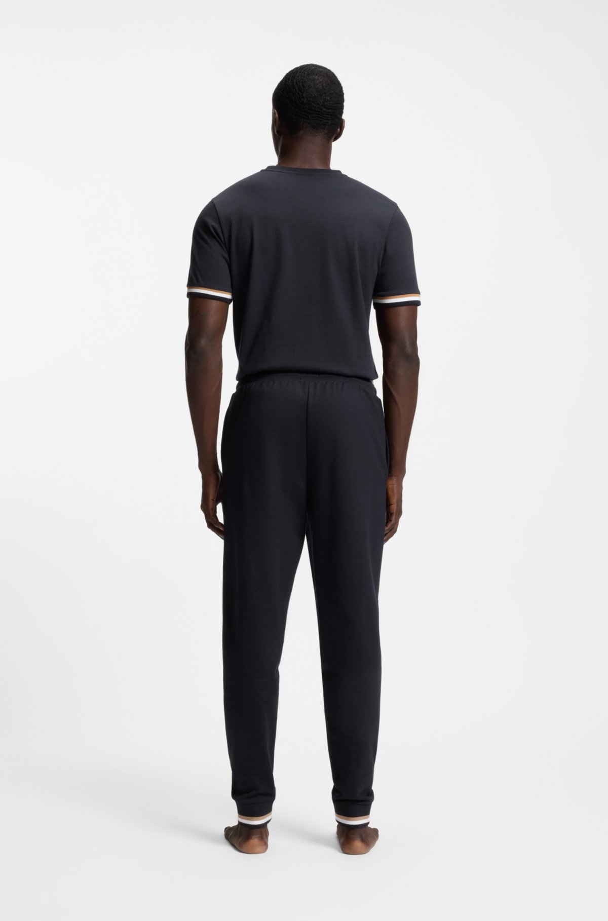 Pantalones de chándal de algodón-terciopelo con rayas características y logo