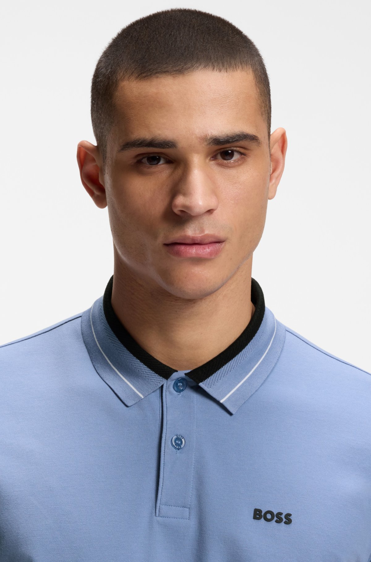 Camiseta polo con detalles de cinta en algodón elástico