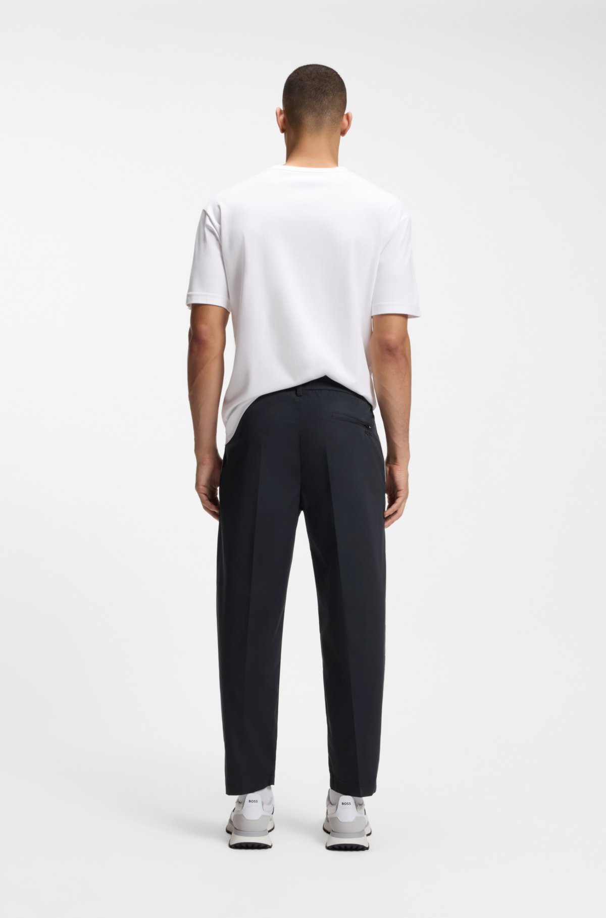 Pantalones de corte entubado con acabado repelente al agua