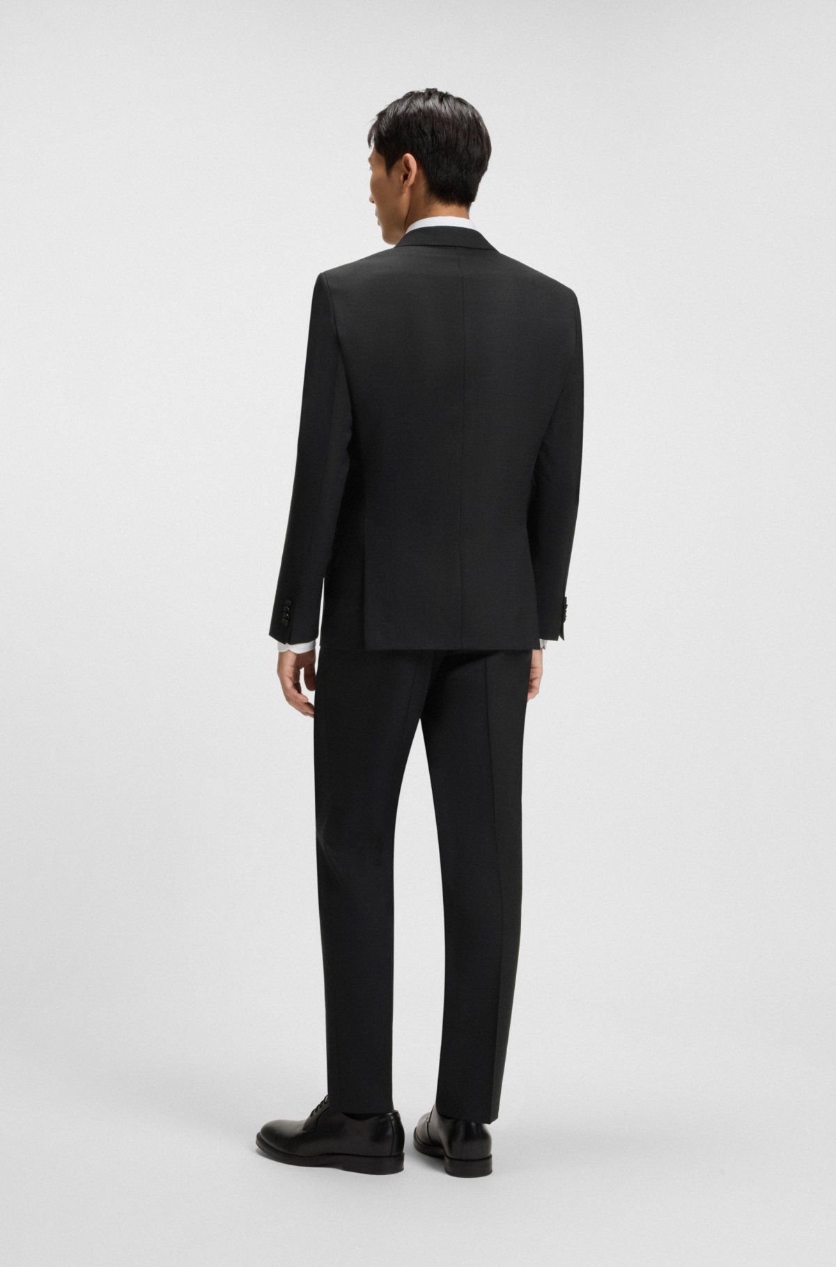 Traje ajustado con patrón microscópico en lana elástica