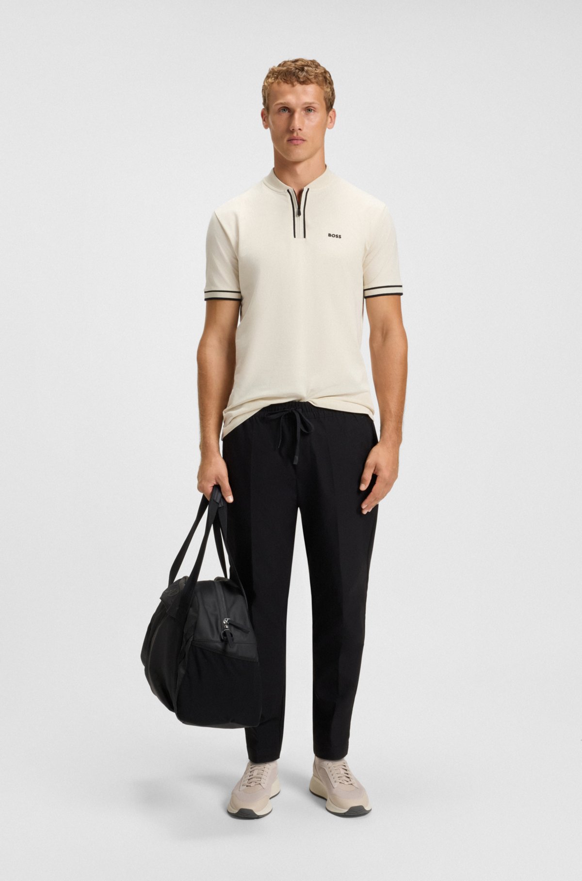Camiseta polo con cuello de cremallera en piqué de algodón elástico