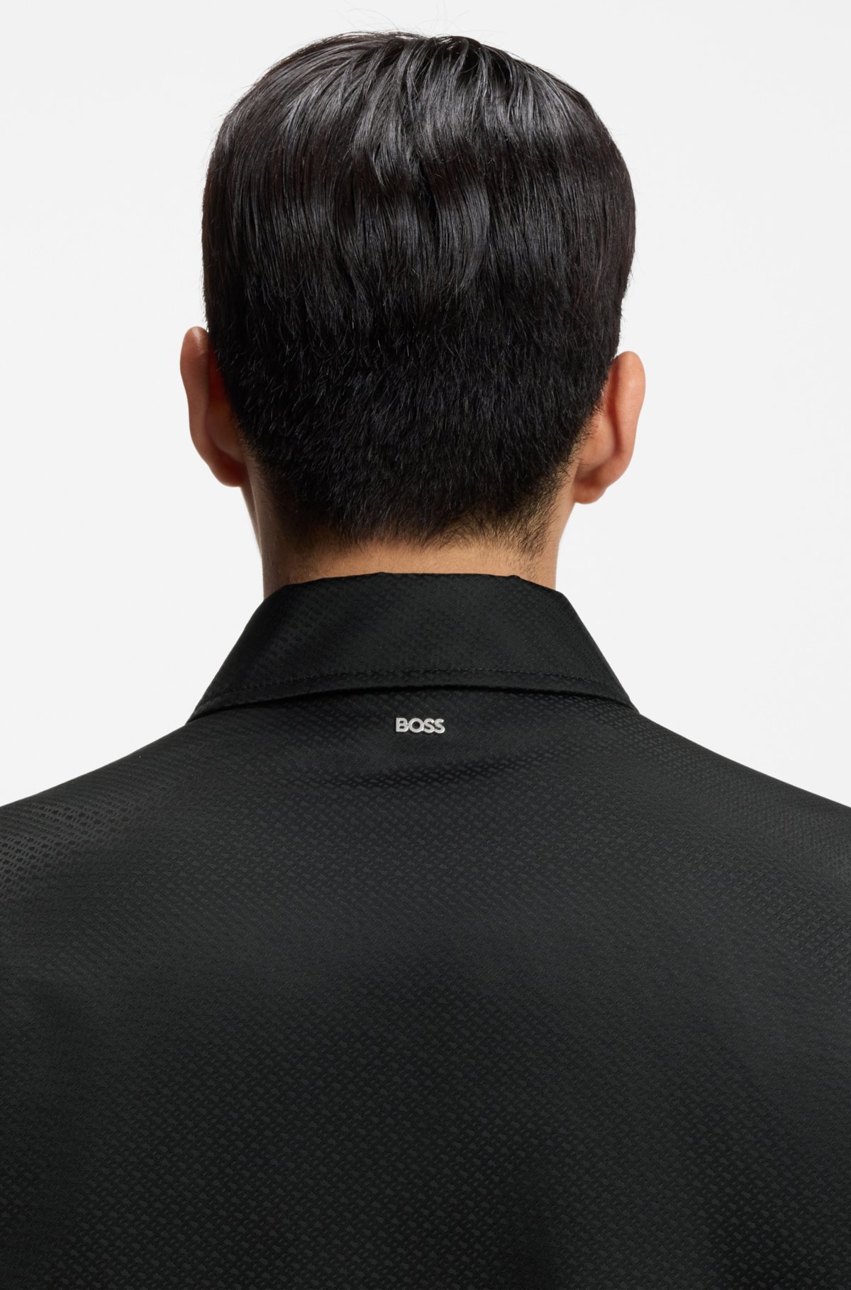 Chaqueta con micromonograma y acabado repelente al agua
