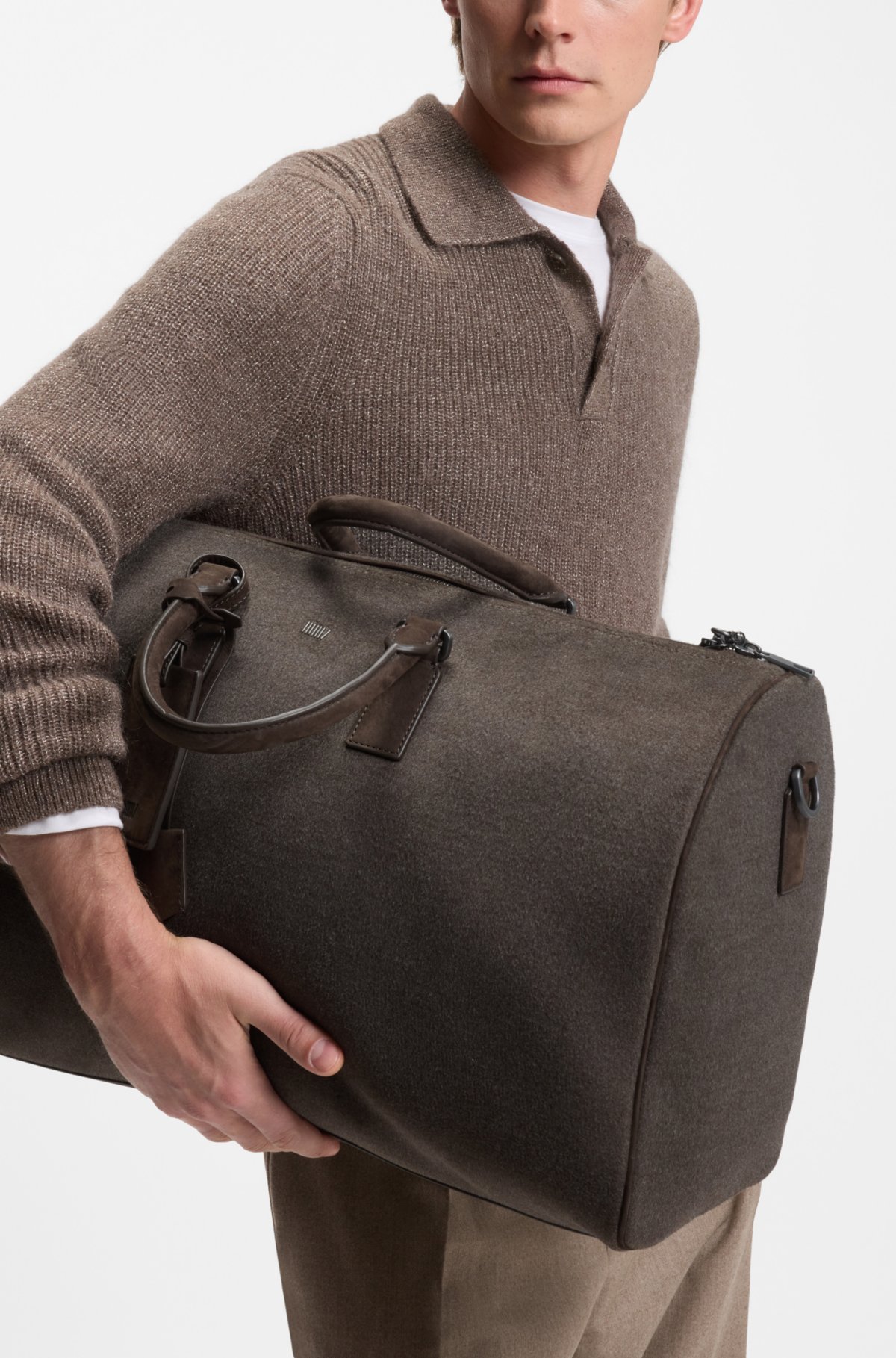 Bolsa de viaje de tela con detalles de cuero